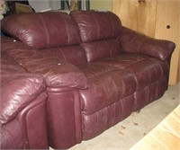 Leather love seat with reclining seats. Measures