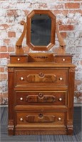 A Victorian Child's Walnut Dresser w/raised