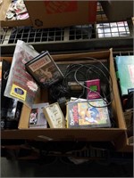 Box of Sega Genesis game console and games