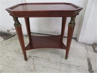 MAHOGANY PARLOR TABLE WITH BRASS FIGURAL BUSTS