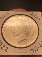 1922 Peace silver dollar in protector