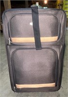 Concourse Rolling Luggage Brown and Tan.
