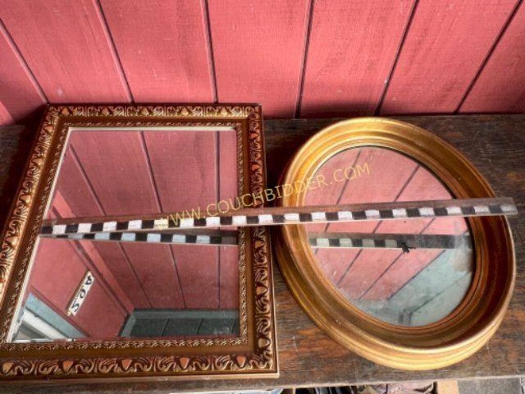 pair of gold framed mirrors- left one is beveled