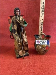 Folk art paper mache figure with jug