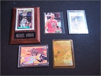 Five Michael Jordan basketball cards including