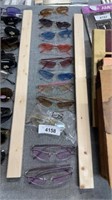 11 pairs of sunglasses