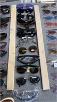 12 pairs of sunglasses