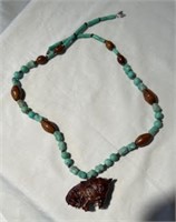 Necklace stone & wood beads with carved horse