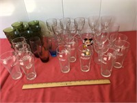 30+ glasses. Coke, stems, water and tea glasses.