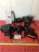 Six cameras. A Kodak EKTRALITE 10. A POLAROID