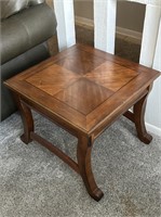 End table with decorative nail heads