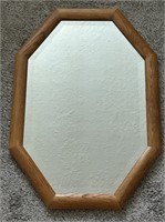 Wooden framed mirror with beveled edges