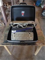 Smith Corona typewriter in case