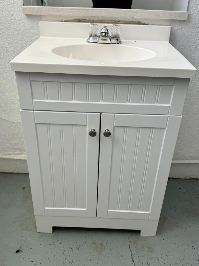 White Sink and Vanity 35T x 24 1/2W x 19D