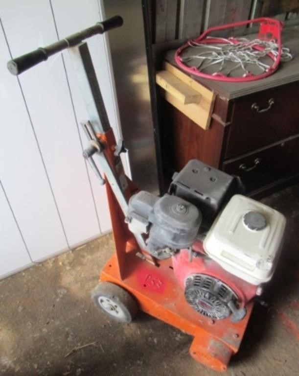 Concrete saw with Honda 340 engine.