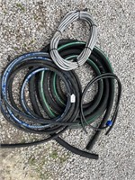 SEVERAL FEET OF NEW RUBBER HOSE (5/8 & 1 1/2)