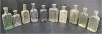 10 VINTAGE CLEAR GLASS APOTHECARY BOTTLES 5"T