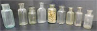 9 VINTAGE CLEAR GLASS APOTHECARY BOTTLES 4-5"T