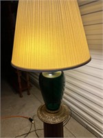 Green glass lamp, heavy metal base