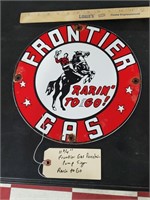 Frontier Gas pump porcelain sign w cowboy 11.75"