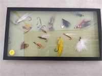 lot of lures and hooks in case