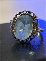 STERLING LADIES RING WITH OVAL PALE BLUE STONE SZ