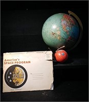 Vintage globe on a stand, one small red hanging