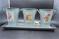 3 decorative flower tins on metal tray