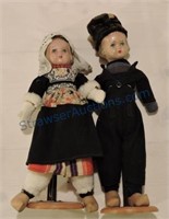 Pair of dolls on stands, 18"