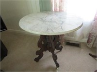 Old marble top round table
