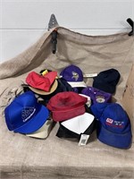 large lot of baseball caps