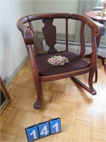 ANTIQUE CLAWFOOT ROCKER WITH CROSS STITCHED