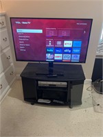 42” TCL Roku smart tv & flawed tv stand