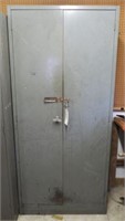 Two door parts cabinet (78” x 36” ) and its