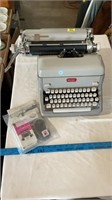 Royal typewriter with accessories ( untested ).