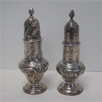 Two antique sterling silver sugar castors