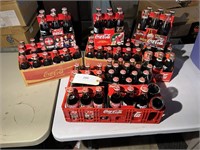 LARGE LOT OF UNOPENED COCA-COLA COMMERATIVE