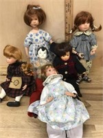 Box of 6 porcelain dolls