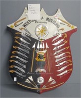 Vintage folk art shield with tin bladed "knives".