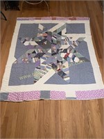 Hand stitched blue and purple big star quilt