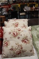 3 large floral cushions.