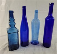 Blue glass bottles, various styles