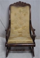 19th Century Curved Back Carved Rocking Chair