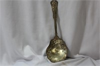 An Ornate Silverplated Serving Spoon