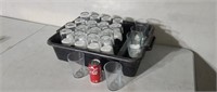 40 Ikea clear glasses in plastic bus tray.