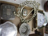 Silver plate jewelry boxes, clock, frame, more.