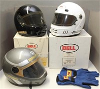 3 motor sports helmets: