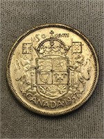 1957 CANADA SILVER ¢50 COIN