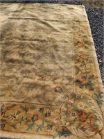 Harvest gold 8' x 10' woven area rug.