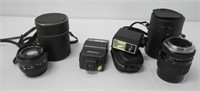 Group of camera lens and flash. Includes Japan,